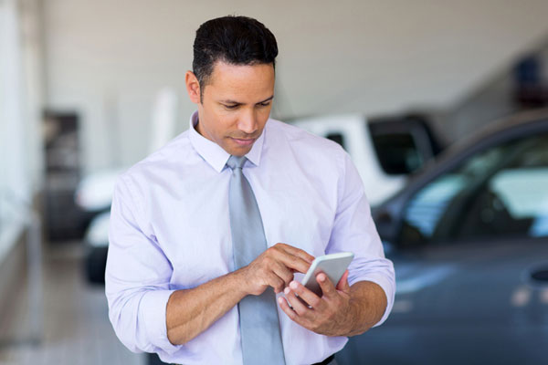 Salesperson on his mobile phone